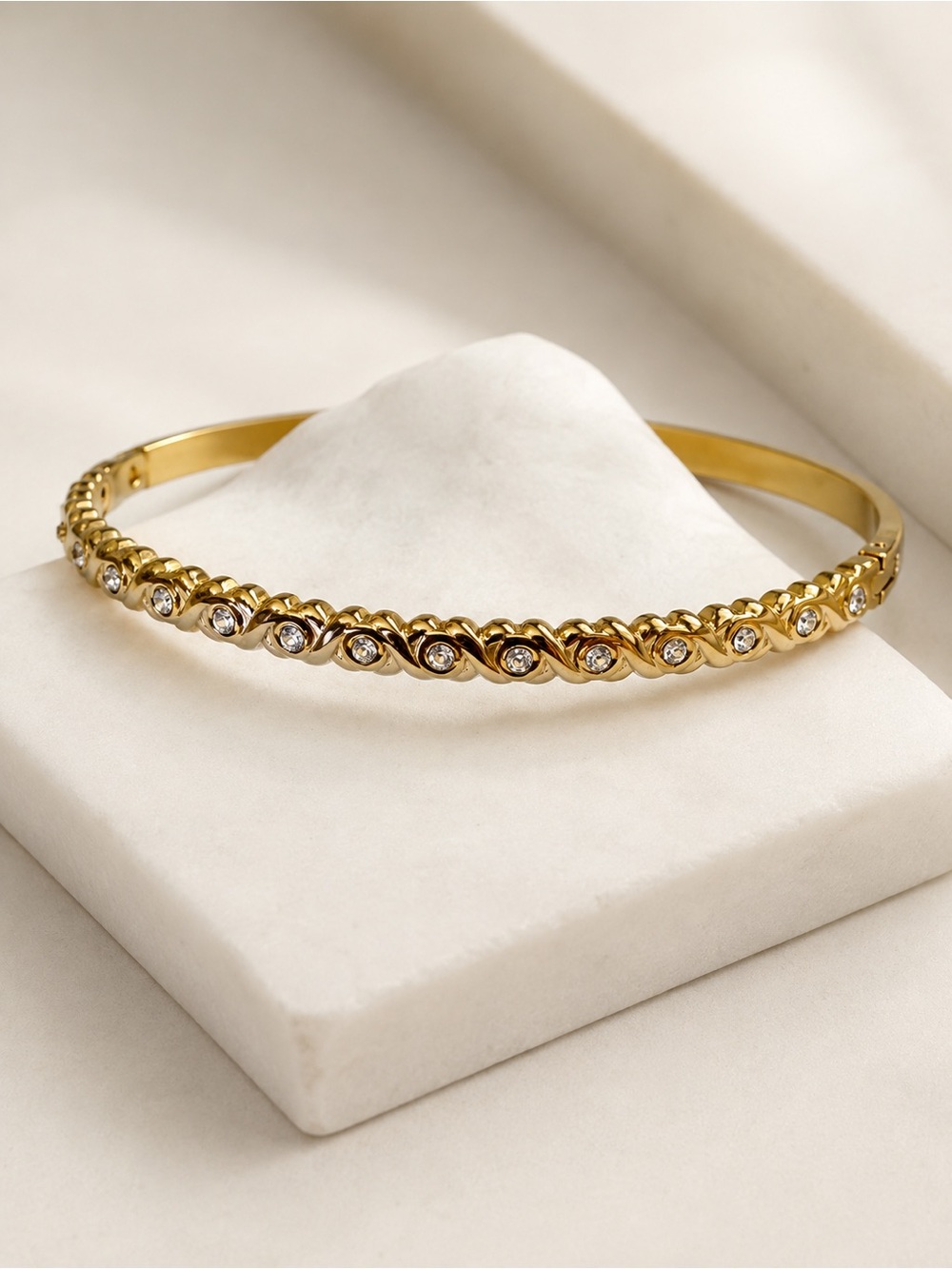 Gold Plated Crystal-Accented Twisted Bangle Bracelet Stainless Steel